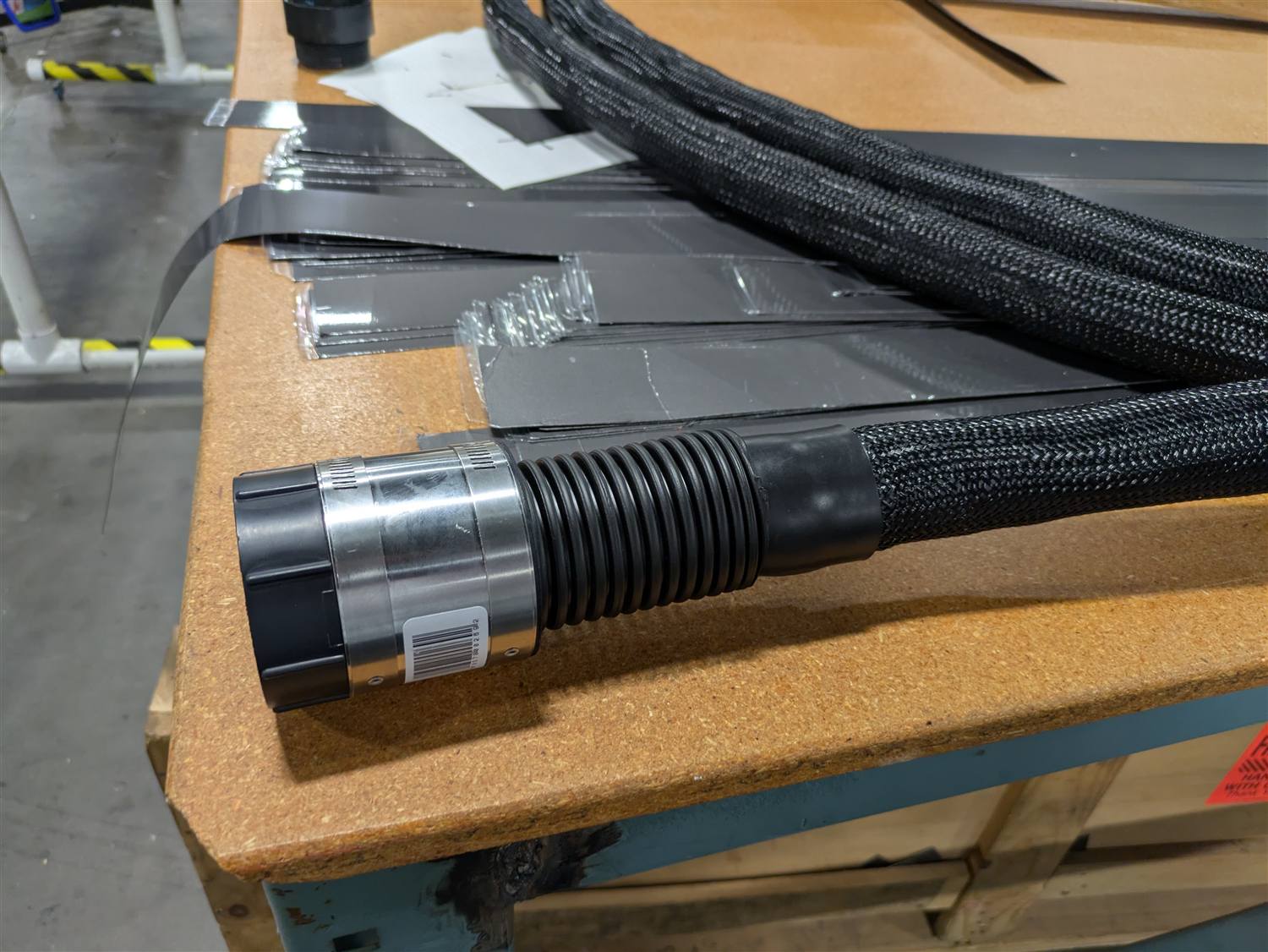 Corrugated boot secured with a stainless clamp collar