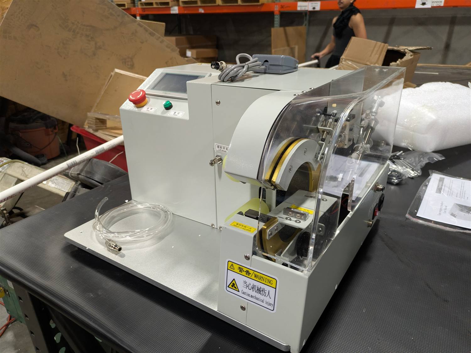 The heater-tape wrapping machine used to wind alloy heater wire onto a process tube